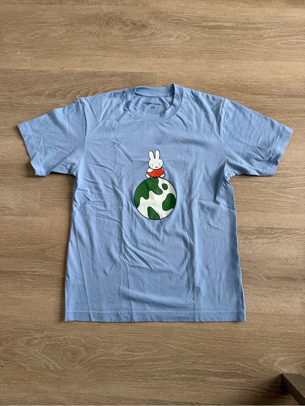 Uniqlo Light Blue Short-Sleeve Tee with Bunny Globe Graphic